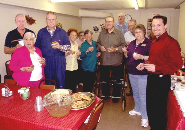 Mayor Kevin Johnston, right. Pictured with Johnston are Wayne Shook (left), Nellie Oliver, Richard Sletten, Sybil Harper, Edith James, Inez Long, John Underwood, Harvey Welty, Tommy Croxdale and GSAC manager Jackie Bader.