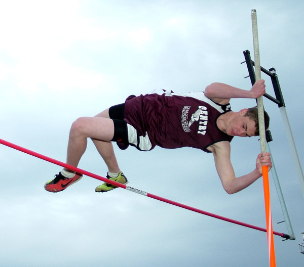 Elijah Ramsey shows good form as he clears the bar during pole vaulting competition at the Gravette Lion Invitational track meet on Monday.