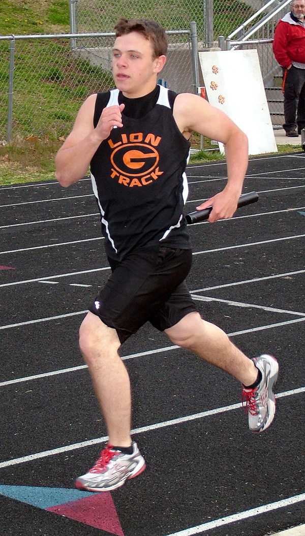 Gravette runner Cody Nims begins his second lap around the track in the 4x400 relays on Monday in Gravette. The Gravette boys won the meet with 92 points.