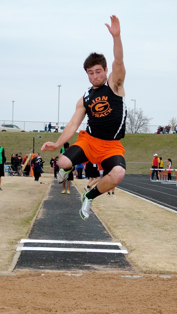 Gravette's Darrick Strzelecki competes in the long jump during the track and field events at Gravette High School on Monday. Gravette's girls finished with 62 points.