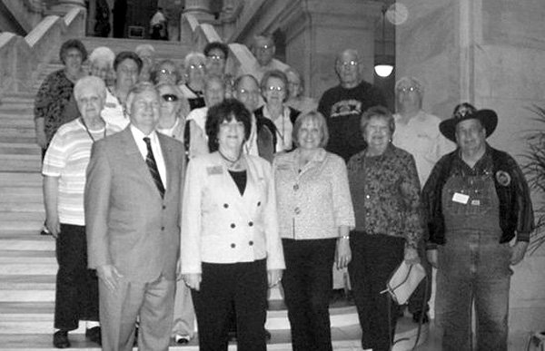 Representatives Mary Lou Slinkard and Jonathan Barnett are on the left, front in the photo. Also pictured are: Nancy Johnson, OHC Director of Senior Services; Mary Kay Kelley, BVH SAC Director; Kathy Patterson, SS SAC Director; Jackie Bader, Gentry Manager; and several area seniors from Gravette, Gentry and Siloam Springs.