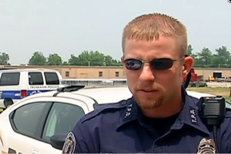 This frame grab from video courtesy of KAIT8-TV shows Trumann officer Jonathan Schmidt in June 2010, in Trumann, Ark. Trumann Police Chief Tony Rusher said the 30-year-old officer was shot and killed during a traffic stop Tuesday, April 12, 2011. 