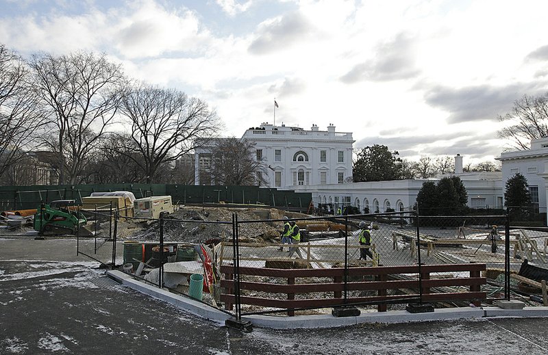 Excavation — not, officials say, work on a secret underground lair — continues near the West Wing of the White House in this photo taken Dec. 14. 
