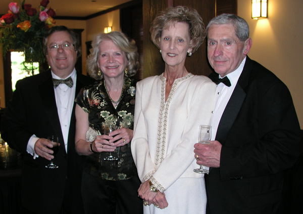 Dr. Roger Bise, president of the board of the Donald W. Reynolds Cancer Support House, from left, and Cygnet Bise join Cathy and Max Correll, board treasurer, at the Wine & Roses gala.