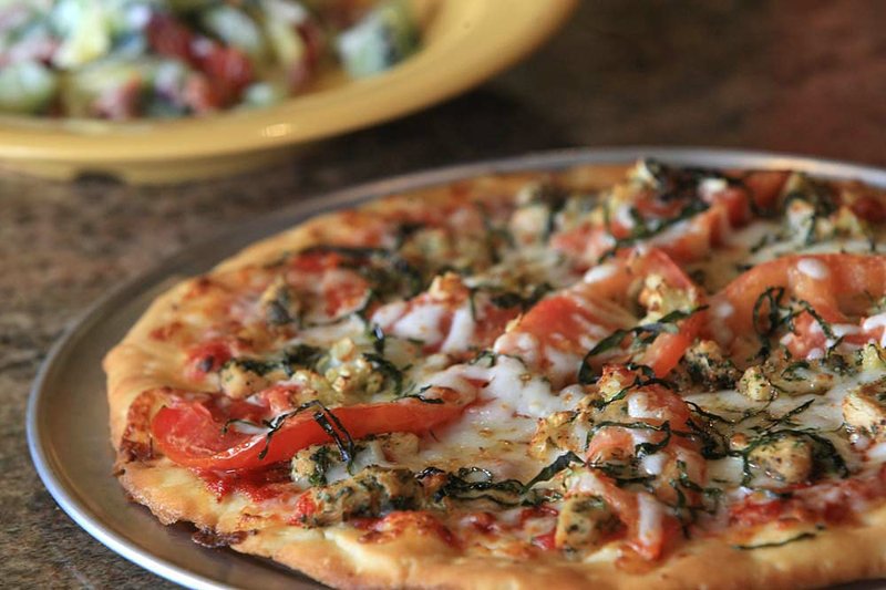  Arkansas Democrat-Gazette/STATON BREIDENTHAL  4/25/11
The cucumber salad and classic pizza at Palio's Pizza.