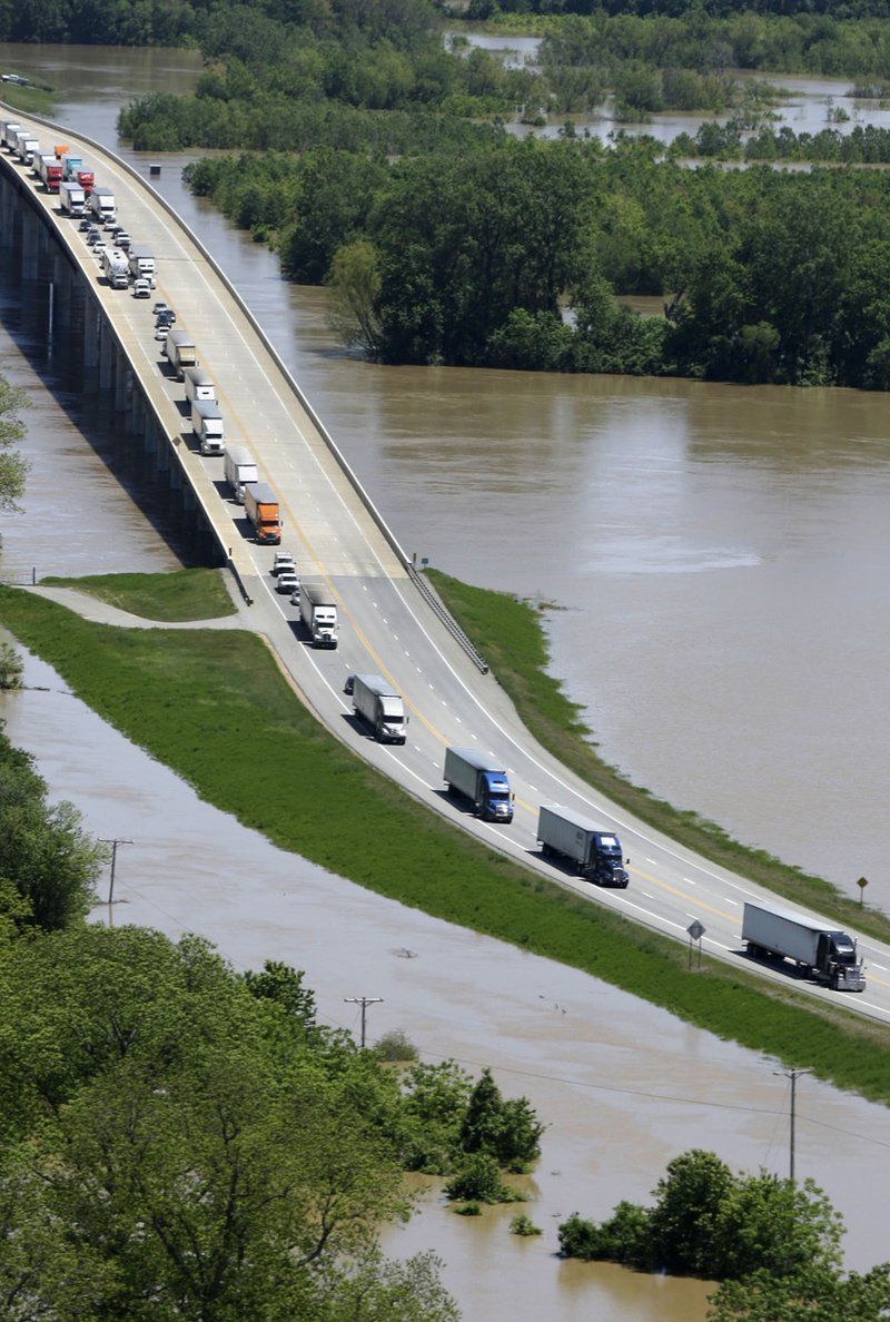 Heavy traffic crosses the White River on a bridge near Augusta, Ark., after the westbound lanes of Interstate 40, about 30 miles south, were closed Thursday, May 5, 2011 due to high water. 