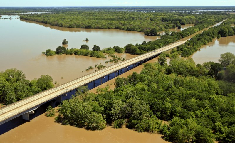 Water from the White River covers part of Interstate 40 (top right), forcing closure for the second day on Friday.