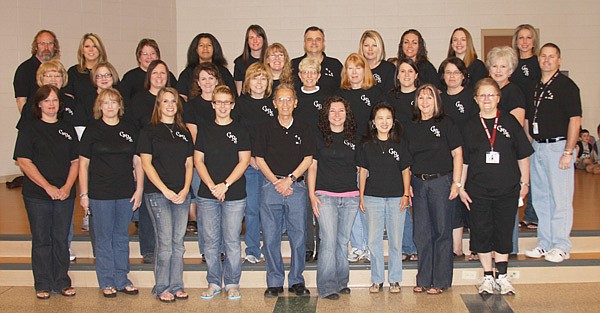 Gentry Primary School teachers and staff pose for a picture during teacher appreciation week. Everyone in the building received a GPS T-shirt, courtesy of Vinyl Visions. 