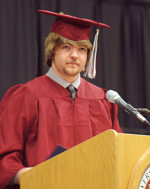 Gentry senior Joe Savage serves as master of ceremonies during Gentry's graduation exercise Monday.