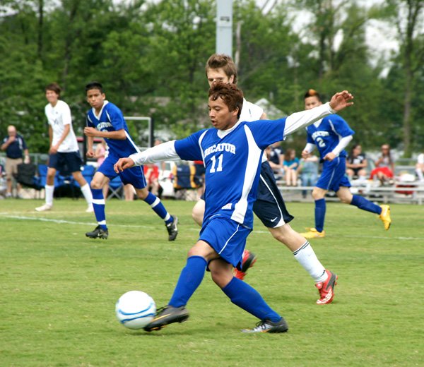 Joe Castaneda moves the ball downfield in state play against Arkansas Baptist at the state tournament in Jonesboro on Friday.
