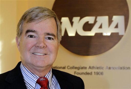 FILE - In this Oct. 7, 2010 file photo, NCAA President Mark Emmert is shown during the Indiana Sports Corporation annual meeting in Indianapolis. The NCAA is telling the Justice Department that its questions about the lack of a playoff system for college football are best directed to another group - the Bowl Championship Series. Emmert, responding to a pointed letter from the department, said his organization has no role in the BCS, other than licensing bowl games. (AP Photo/Darron Cummings, File)