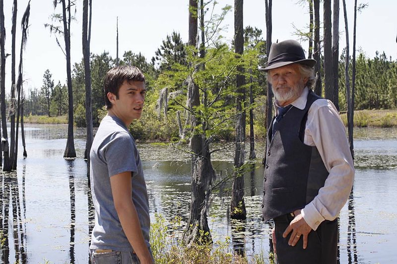 Fleming (Reece Thompson) bonds with his absentee grandfather E.F. Bloodworth (Kris Kristofferson) in Bloodworth. 