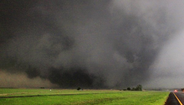 A half-mile-wide tornado moves north in Canadian County after having just crossed SH-3, the Northwest Expressway, west of SH-4 moving towards Piedmont, Okla. Tuesday, May 24, 2011. 
