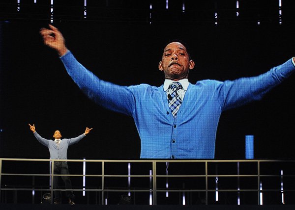 Actor Will Smith hosts the Walmart shareholders meeting Friday at the University of Arkansas’ Bud Walton Arena in Fayetteville.
