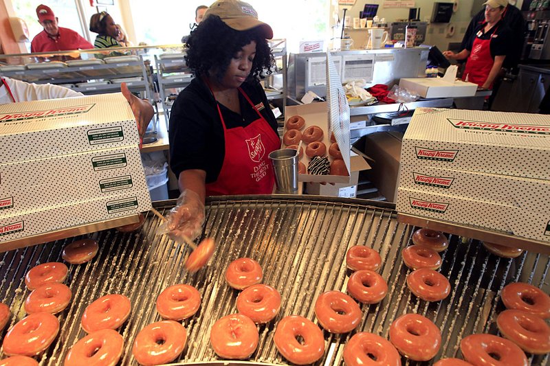 The Krispy Kreme location on Shackleford Road in Little Rock is among the outlets participating in a buy-a-dozen, get-a-dozen free National Superhero Day promotion April 28. 