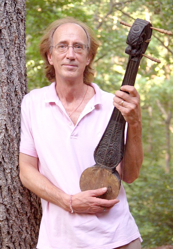 Steven Lowe, now living in western Benton County, displays an example of the traditional art techniques he learned and created in Nepal.
