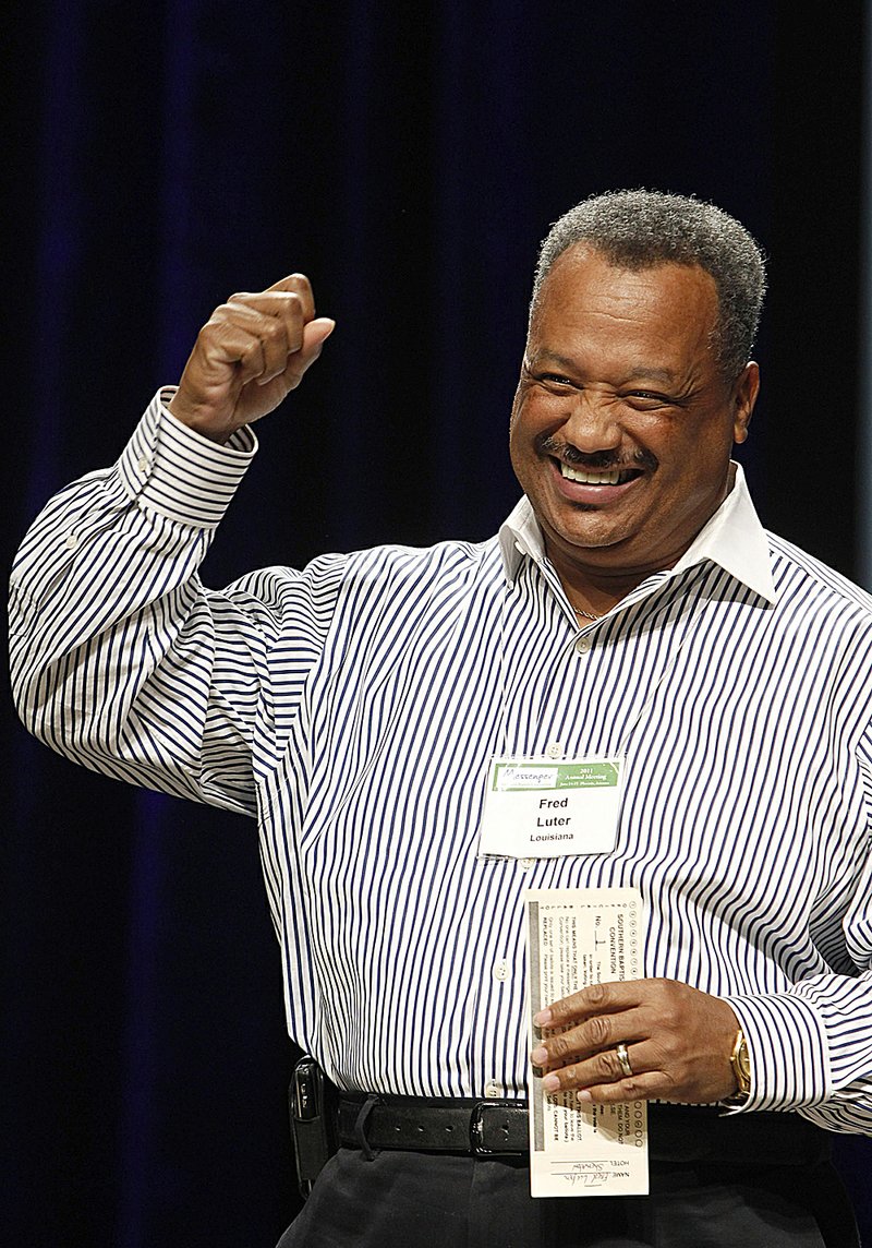 New Orleans pastor Fred Luter greets the gathering Tuesday night in Phoenix before his election as first vice president of the Southern Baptist Convention. 