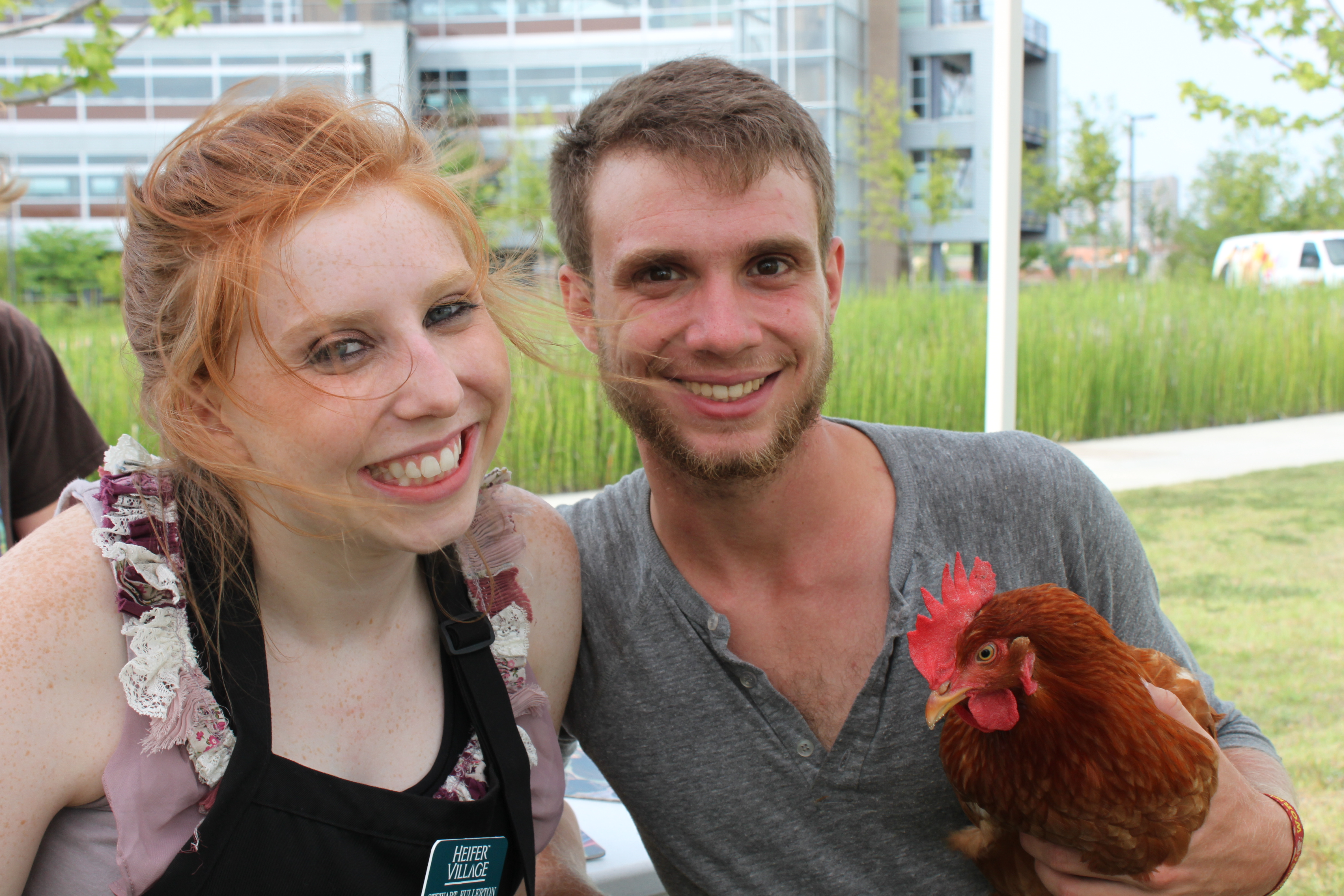 Stewart Fullerton and Rob Moore holding chicken