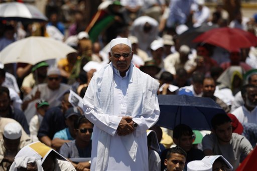 A Libyan prays during Friday prayers in Benghazi, Libya, Friday, June 24, 2011. 