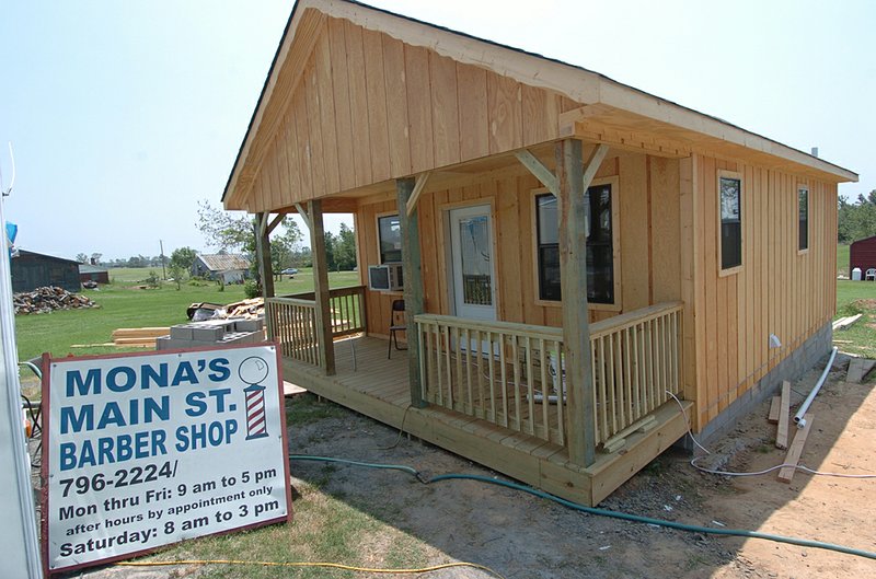 Mona Peach’s old barbershop was destroyed in an April 25 tornado in Vilonia but has been replaced with a new building. 