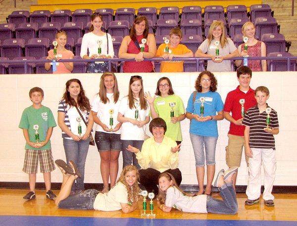 Pictured are first-place winners at the Ozark District 4-H O’Rama Competition Day. On the floor are: Janeé Shofner, Sayer Smith, and Kendall Yarbrough. Row two: Ty Connolly, Samantha Brandeberry, Samantha Lambert, Sarah Mills, Carley Goggans, Casey Jarding, Noah Smith and Ethan Parker. Top: Alex Joyce, Adriana Joyce, Jessica Romines, Mitchell Baker, Ashton Yarbrough, Holly Holmes-Smith.
