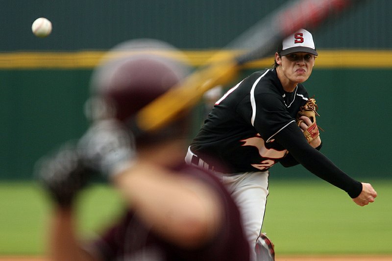 Searcy starting pitcher Dillon Howard delivers against Benton during the 6A state championship game Friday, May 8, 2009 at Baum Stadium in Fayetteville.