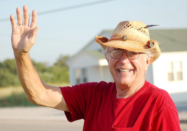 Bubba Williams, owner of Cherokee Woodworks in Hiwasse, shares his signature morning greeting with passersby each weekday morning. “I think of them as my friends,” he explained.