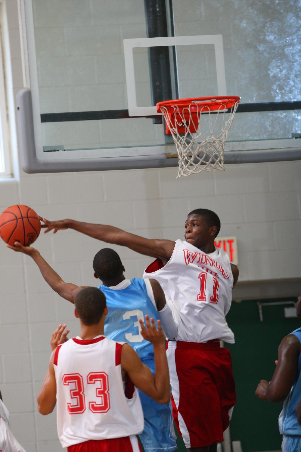 7/6/11
Arkansas Democrat-Gazette/STEPHEN B. THORNTON
Arkansas Wings Elite's DaNerryen Spencer
blocks a shot by Montgomery TarHeels' Tony McAroy  during their AAU basketball game Wednesday afternoon at Philander Smith College.7/6/11
Arkansas Democrat-Gazette/STEPHEN B. THORNTON
Montgomery TarHeels versus Arkansas Wings Elite during their AAU basketball game Wednesday afternoon at Philander Smith College.