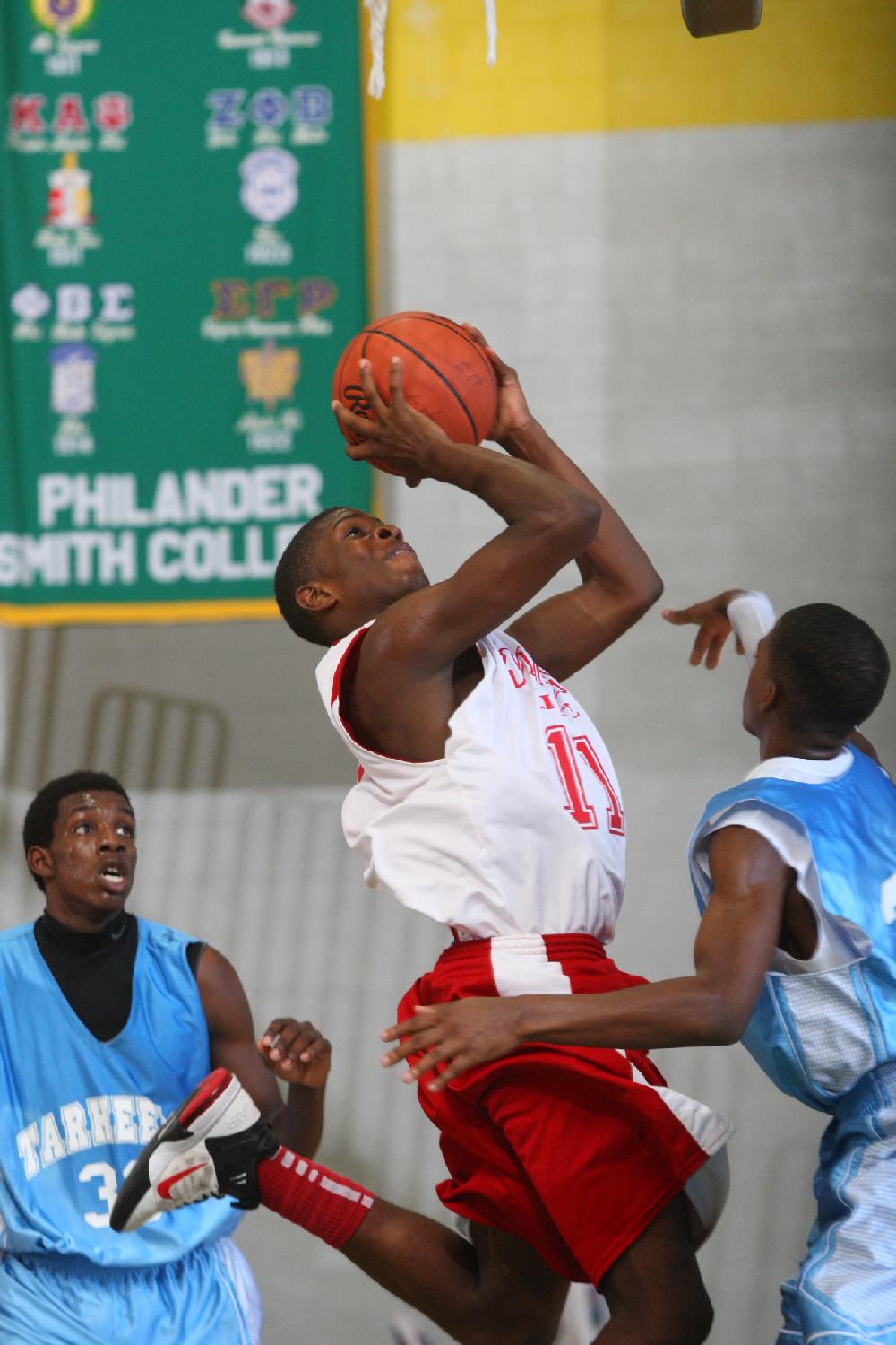 7/6/11
Arkansas Democrat-Gazette/STEPHEN B. THORNTON
Arkansas Wings Elite's DaNerryen Spencer
 drives to the basket during their game with Montgomery TarHeels'  during their AAU basketball game Wednesday afternoon at Philander Smith College.7/6/11
Arkansas Democrat-Gazette/STEPHEN B. THORNTON
Montgomery TarHeels versus Arkansas Wings Elite during their AAU basketball game Wednesday afternoon at Philander Smith College.