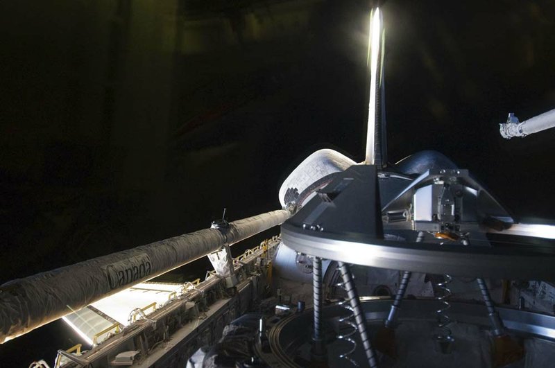 This Sunday, July 10, 2011 photo provided by NASA shows the docking mechanism in space shuttle Atlantis' payload bay shortly before the shuttle docked with the International Space Station.