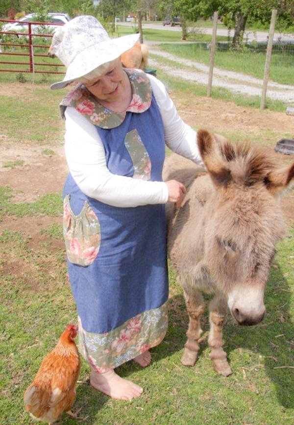 Freddie Arbuthnot — or “Mema” — enjoys the company of people and animals in her Hiwasse home.