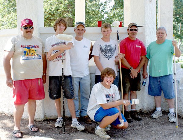 Eagle Scout Russell Sharp with his helpers at the Gravette bandstand from the left, Roger Sharp, Rob Benson, Scout Leader Kelly Kane, Trent Trembly, Scout Leaders Scott Key and Mike Cowick.