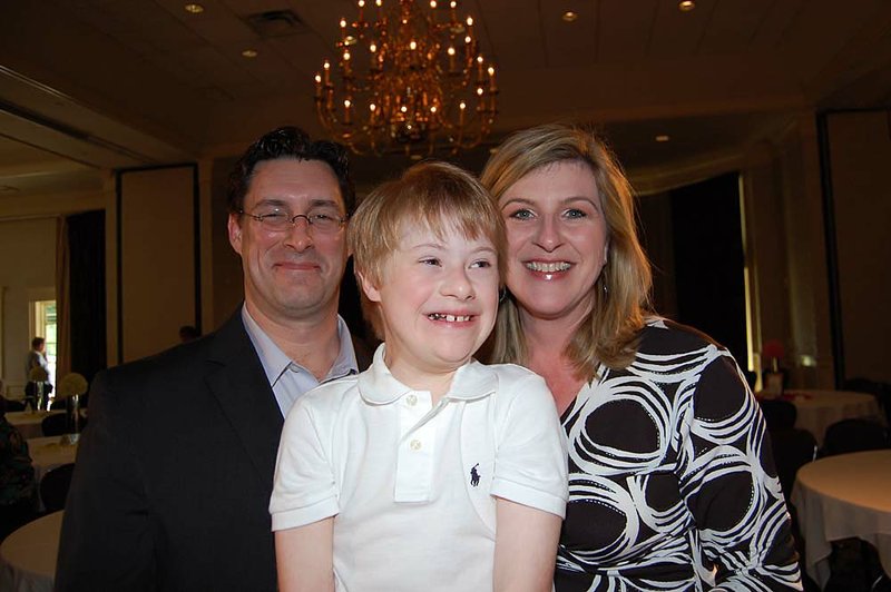 James and DeAnn Hunt use help from Medicaid to pay for treatment for their son, Al, who has Down’s syndrome. 