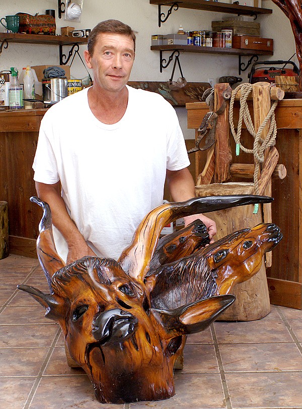 From a tree stump and roots to a work of art, Curtis McChristian sees possibilities others miss and brings out scenes and characters from nature and of the Old West and the days of cattle drives.
