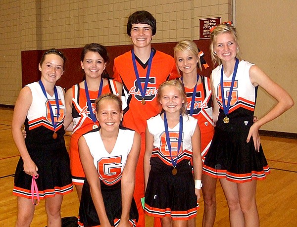 Gravette All-American cheerleaders, back row, Taylor Eaton, Kayla Holliday, “Leo the Lion” Sayer Smith, Candace Pembleton and Meghan McAfee. Front row, A.J. Clabon and Micayla Hendricks.
