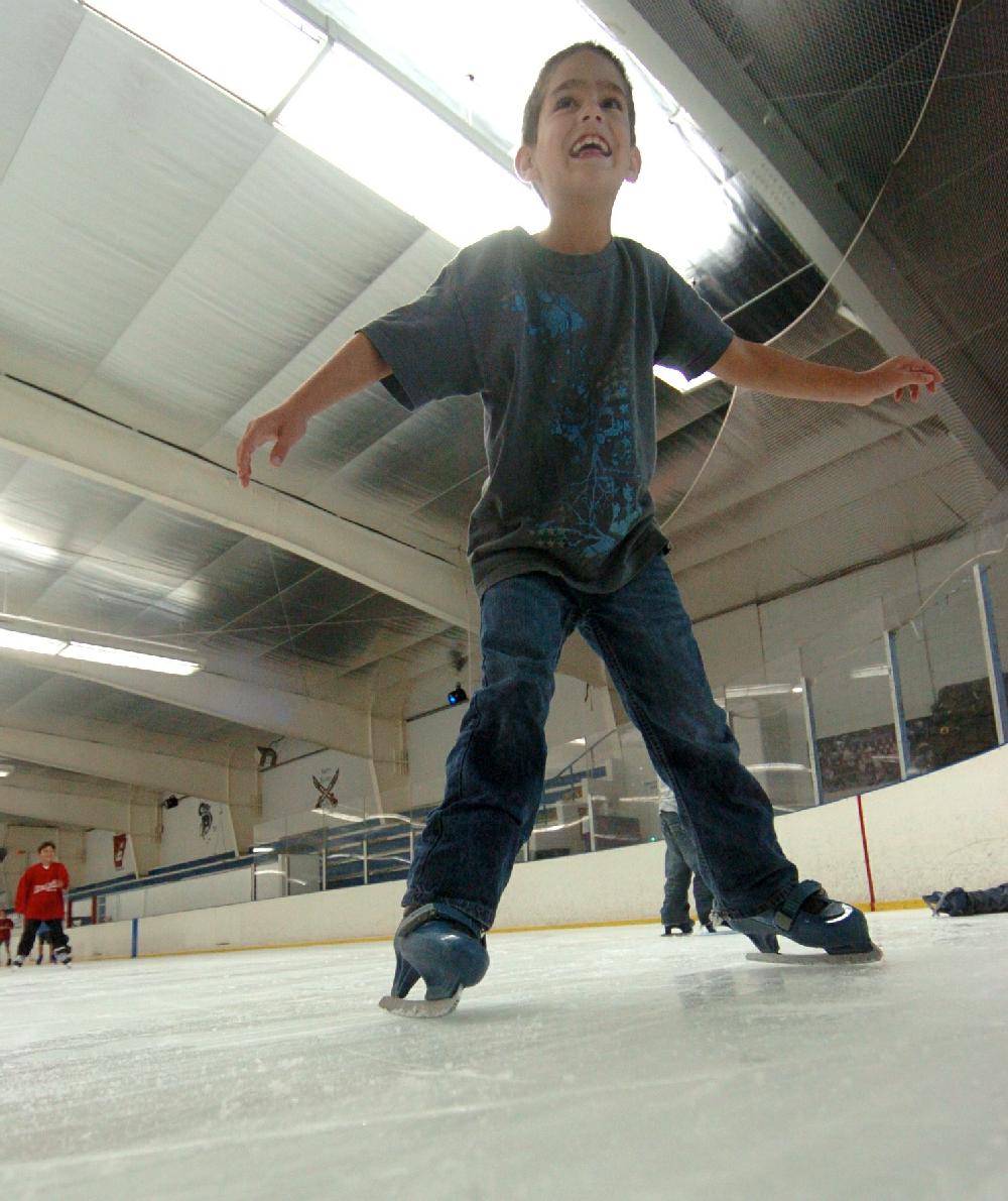 Arkansas Democrat-Gazette/STEVE KEESEE 8/2/11 Corbin Desoto, 8,  visiting the Arkansas Skatium's ice skating rink, 1311 S. Bowman Rd. Little Rock, with a group from Malvern, found the ice Tuesday nice and cool.