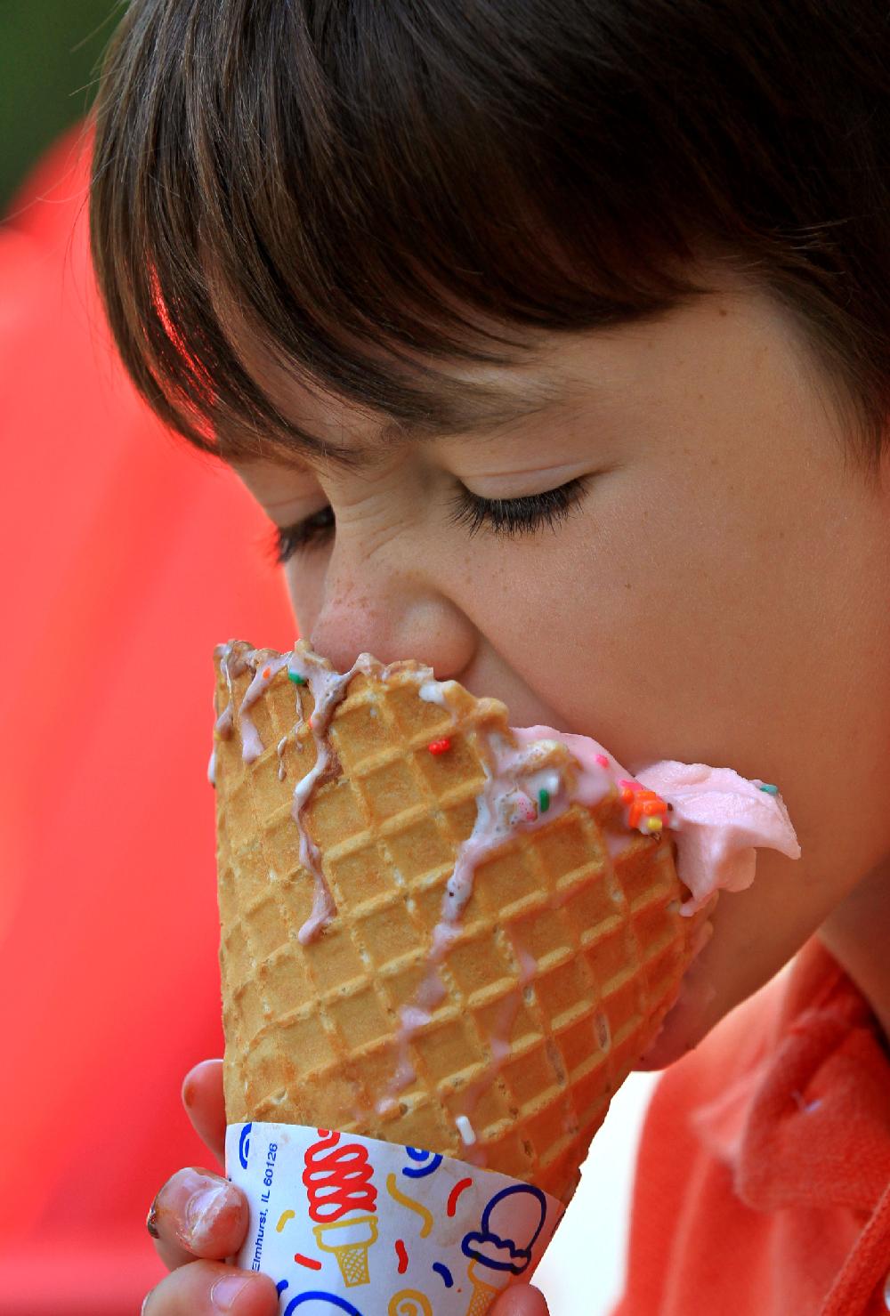 Arkansas Democrat-Gazette/BENJAMIN KRAIN --8/2/11--
Ice cream melts before Griffin Haynes, 6, can eat his cone while he cools off from over 100 degree temperature at Key West in Maumelle on Tuesday.