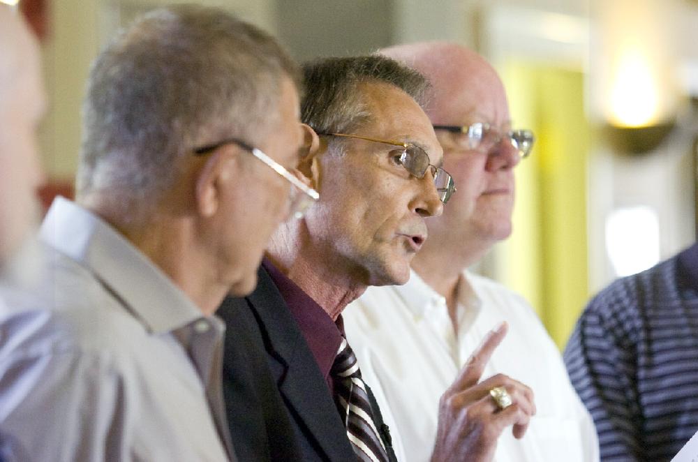 Arkansas Democrat-Gazette/KAREN E. SEGRAVE
8/2/11

Farris Hensely (center) a member of The Little Rock Police Pension Board addresses the media at a press conference on Tuesday with concerns that the current sales tax increase proposal does not provide enough justification for the wide variety of city services the sales tax would benefit.  Hensley is flanked by other pension board members, Donald Wood (L) and Lee Harrod.