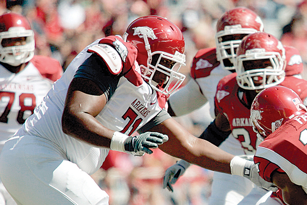 Arkansas Democrat-Gazette/JASON IVESTER --04/16/11--
UA Red-White Spring Game
Offensive lineman Jason Peacock