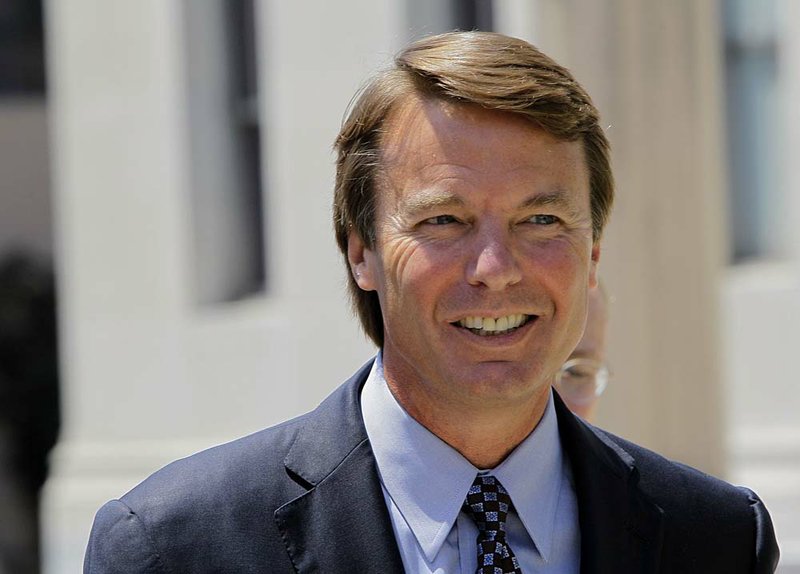  FILE - In this July 14, 2011 file photo, former presidential candidate John Edwards leaves federal court following an appearance in Greensboro, N.C., Thursday, July 14, 2011.   Two legal cases involving former presidential candidate John Edwards are beginning to seem like different versions of the same play, with overlapping plots, characters and action _ but running simultaneously on separate stages. The increasingly convoluted drama led a veteran judge on Friday, July 29, 2011 to delay a civil trial involving a sex tape purportedly featuring the former U.S. senator until March 2012. 