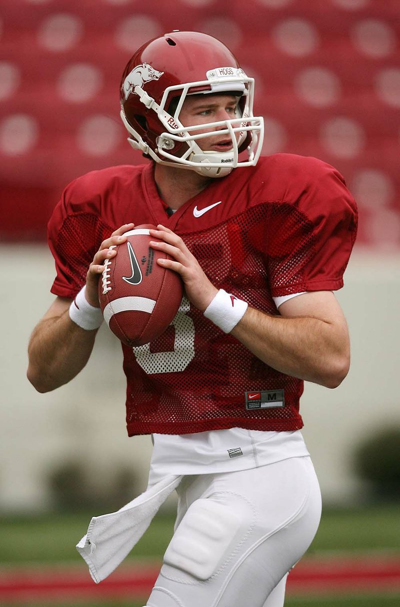  Arkansas Democrat-Gazette/WILLIAM MOORE
Arkansas quarterback Tyler Wilson runs through drills during spring practice Tuesday, March 30, 2011 at Reynolds Razorback Stadium in Fayetteville.