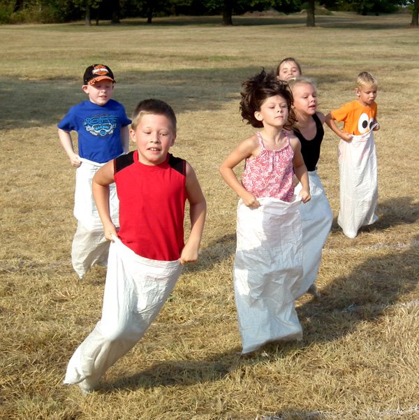 Deegan Brooks, Lane Wilkins, Maci Hubbard, Olivia Verser, Emily Jessen and Kaden Owens competed in the sack race during the children's games on Saturday morning.