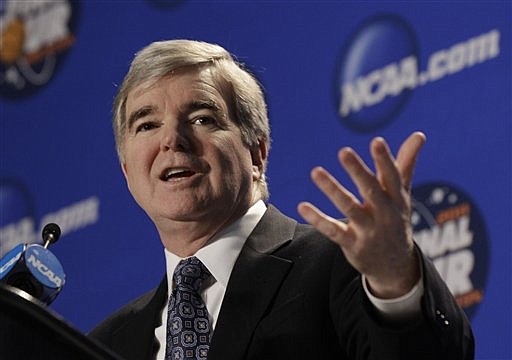 FILE - This March 13, 2011, file photo shows NCAA President Mark Emmert speaking at a news conference at the men's Final Four, in Houston. Emmert wants to make big changes, and he's asking schools to help. Emmert spent Tuesday and Wednesday, Aug. 9-10, 2011, meeting with more than five dozen university presidents and school administrators about the future of the NCAA. (AP Photo/David J. Phillip, File)