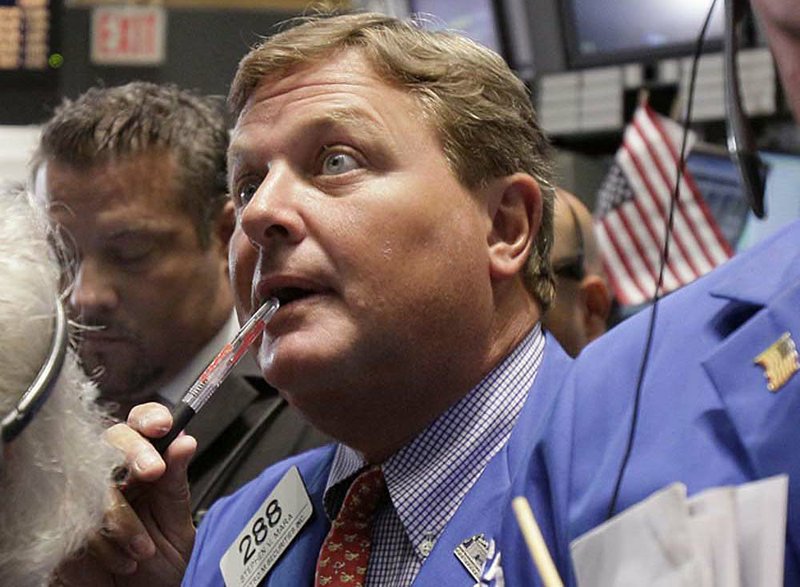 Trader Stephen Mara breathes easier Monday at the New York Stock Exchange, but analysts weren’t ready to declare the market settled. 