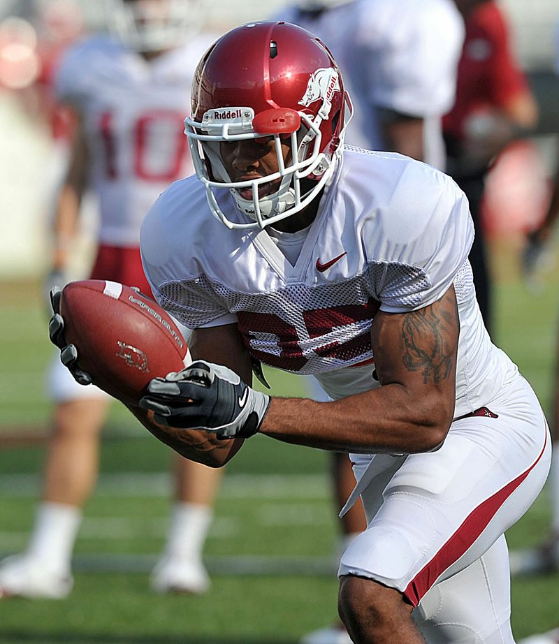 Arkansas wide receiver Greg Childs says he will be fine for the Razorbacks’ opener but is still searching for a missing step. 