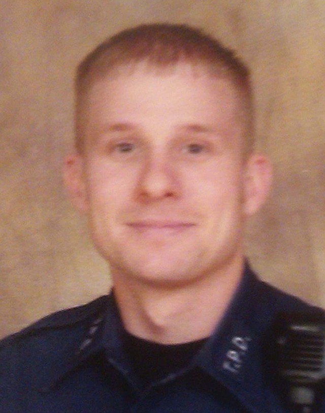  This undated photo released by the Trumann Police Department shows Trumann police Officer Jonathan Schmidt. Schmidt was killed late Tuesday, April 12, 2011, when a suspect opened fire on Schmidt and another officer during a late-night traffic stop. 