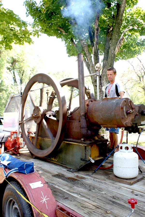 One of the exhibits enjoyed most on the lawn at the Gravette Historical Museum during the Gravette Day celebration was a display of antique machinery from Tired Iron of the Ozarks from Gentry.