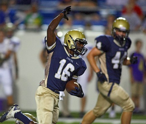 Arkansas Democrat-Gazette/STEPHEN B. THORNTON - Pulaski Academy's Aum'Arie Wallace (16) runs a kickoff into the endzone for a touchdown against Central Arkansas Christian during the 2011 Arkansas High School Kickoff Classic Monday evening at War Memorial Stadium. 