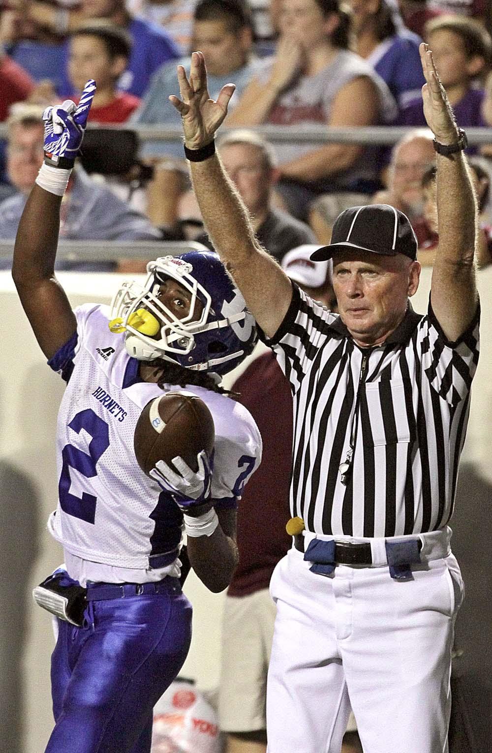 Arkansas Democrat-Gazette/BENJAMIN KRAIN --9/2/11--
Bryant's Dillion Winfrey celebrates a touchdown in the first quarter during the Salt Bowl at War Memorial Stadium in Little Rock Saturday night.