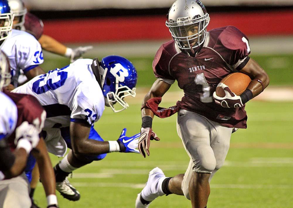 Arkansas Democrat-Gazette/BENJAMIN KRAIN --9/2/11--
Bryant's Tyree Reese tries to tackle Benton's Wallace Foote during the first half of the Salt Bowl at War Memorial Stadium in Little Rock Saturday night.